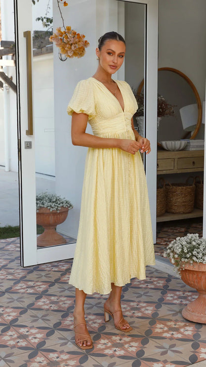 Yrsa™ | Elegant klänning med puffärmar och knappa